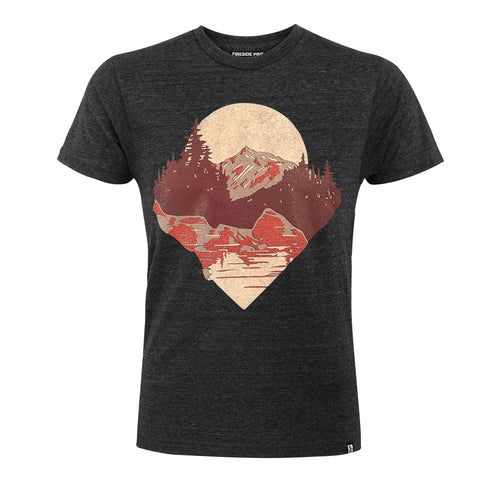 The Hidden Idaho - Charcoal tee by Fireside Pine features a soft fabric and a diamond-shaped graphic of mountains, trees, and a lake in earthy red and beige tones.