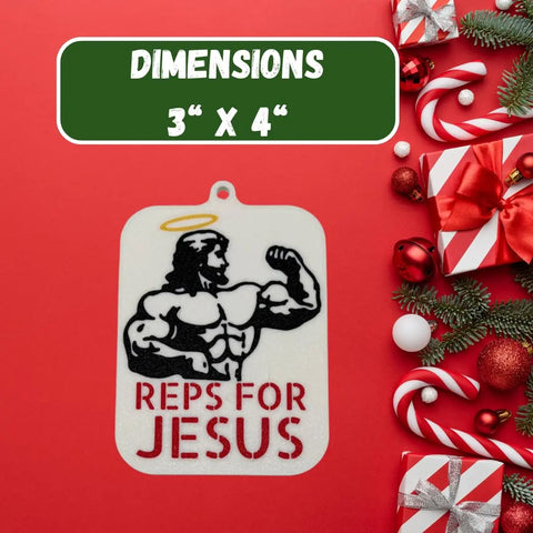 The Reps for Jesus Weightlifting Christmas Ornament by Chatelet Manufacturing features a muscular cartoon Jesus with a halo, surrounded by festive décor. Dimensions appear at the top. Perfect for Christian bodybuilders! Made in the USA.