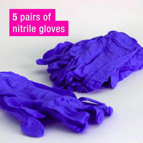 Two stacks of bright purple ArtResin nitrile gloves from the ArtResin Accessory Kit sit on a light surface, with a pink label stating 5 pairs of nitrile gloves—essential for achieving professional results in resin art.