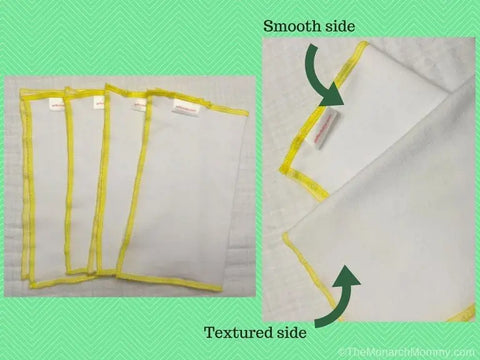 On the left, four white Geffenbaby Reusable Baby Wipes - Hemp/Organic Cotton French Terry with yellow edges are displayed. On the right, a close-up highlights one wipes smooth side and anothers textured side, all set against a green chevron background.