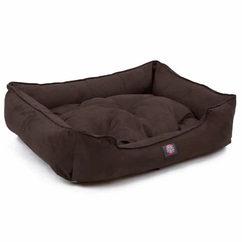 The Majestic Pet Suede Contemporary Lounge Bed is a rectangular, dark brown pet bed with raised sides and a soft, cushioned center, shown on a white background.