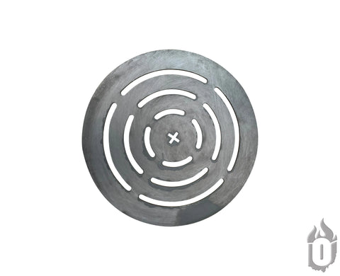 The Ohio Flame Round Steel Log Grate, a durable fire pit accessory made in the USA, features curved and straight cutout slots in a patterned round metal design with a central X. The image shows a white background and an O-shaped flame icon in the lower right corner.