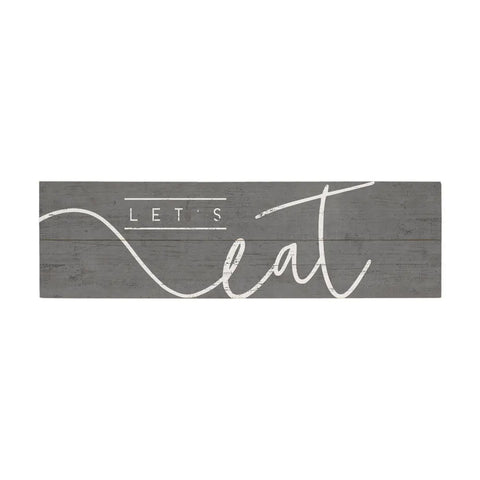 The Sincere Surroundings Lets Eat | Wall Art showcases “Lets Eat” in white script on gray wood, perfect as rustic kitchen décor or a vintage-inspired accent.