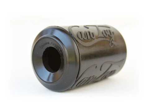 The SodaPup SP Magnum Can Toy EDispenser is an ultra durable black rubber chew toy and treat dispenser, shown from an angle revealing its hollow end and side details, placed on a white background.