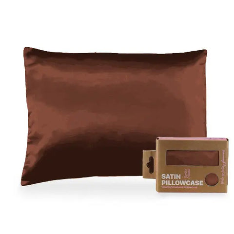 A Morning Glamour Satin Pillowcase Standard/Queen Single is shown in eco-friendly packaging with a clear window displaying the pillowcase inside—ideal for healthier hair and smoother skin. Multiple color options available.