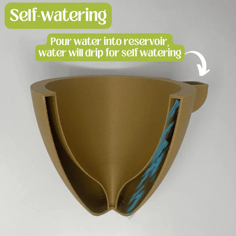 A cross-sectioned brown Magic Wall Planter by Chatelet Manufacturing shows its internal water reservoir and soil chamber. Blue lines illustrate easy, self-watering action—just pour water in and let these wall planters manage the flow for you.