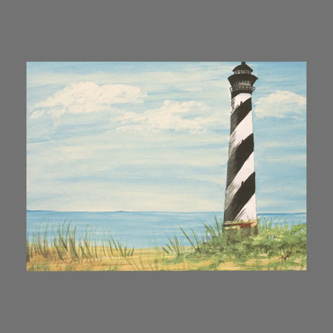 JuLu Cards’ Pack of 4 - Black and White Lighthouse on Beach (20004) features striking 4.5 x 6.25 cards with envelopes—showcasing a scenic striped lighthouse by the shore, ideal for sending thoughtful notes.