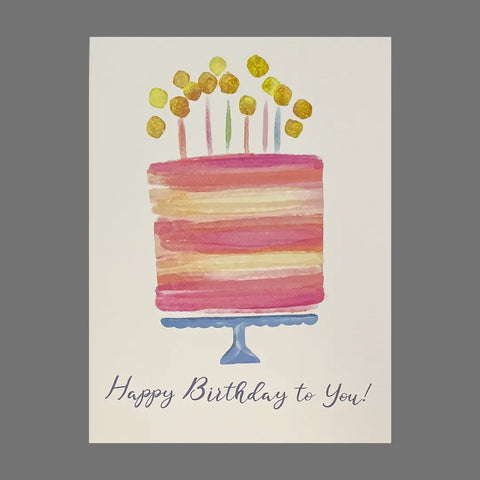 JuLu Cards Pack of 4 - “Happy Birthday to You!” With Cake (20049): Features a pink cake with yellow accents on a blue stand, 4.5 x 6.25-inch cards with envelopes, white background and gray border—perfect for birthdays!.