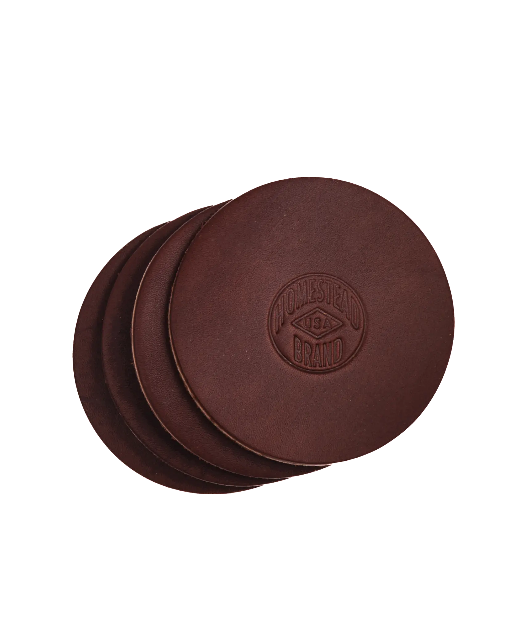 Six brown full grain leather coasters, each embossed with the Homestead Brand logo in the center. The Leather Coasters - Set of 6 No. 1701 are proudly made in the U.S.A.