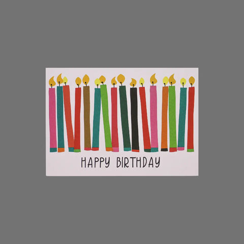 JuLu Cards Pack of 8 Happy Birthday With Lit Candles (10050) features colorful candles above “Happy Birthday” on a white background. Each 3.5 x 5 inch card comes with envelopes included.