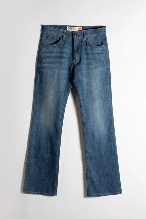 The Boot Cut Medium Wash Denim jeans by Marc Nelson feature a classic five-pocket design, slight fade, and straight legs, displayed flat on a white background.