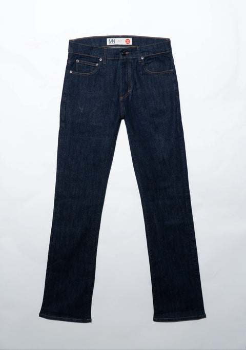 The Boot Cut Dark Wash Denim by Marc Nelson is displayed front-side up on a white surface, featuring visible pockets, belt loops, and a button closure. These stylish jeans are proudly made in the USA for trusted quality.