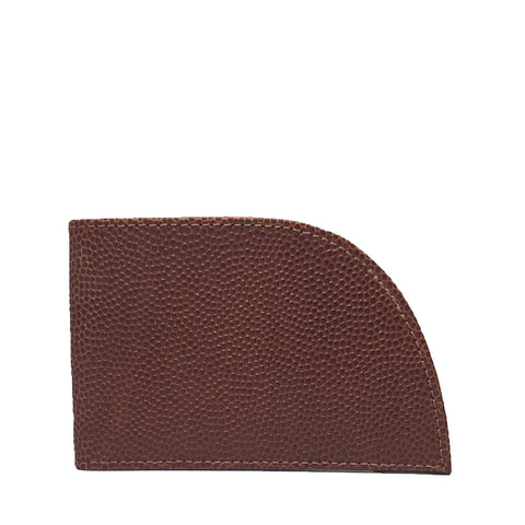 The Rogue Industries Football Leather Front Pocket Wallet, made from brown textured Horween leather, features a unique curved edge on the right side and is shown against a plain white background.