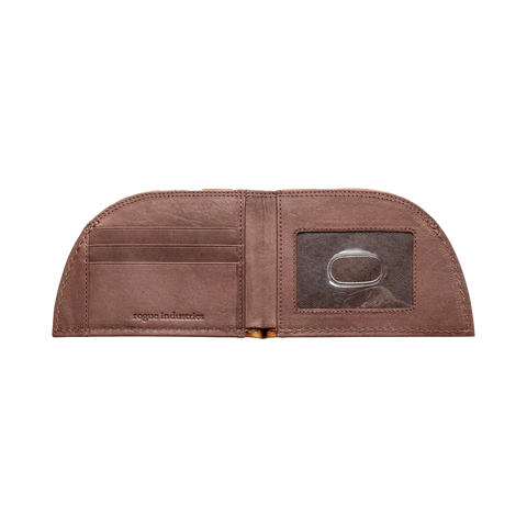 The Football Leather Front Pocket Wallet by Rogue Industries features brown Horween leather, curved edges, three left card slots, an ID window with a metal ring on the right, and rogue industries embossed below the card slots.