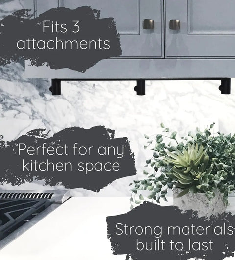 Modern kitchen with marble backsplash and grey cabinets. Text overlay: Chatelet Manufacturing Slim Profile Mixer Organizer Mount fits 3 Kitchen Aid mixer attachments—space-saving, durable, wall or under-cabinet solution. Made in USA.