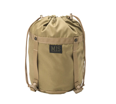The MIS Compression Stuff Sack Small in Coyote Tan features durable Cordura nylon, a drawstring closure, side straps, and a front patch. Its water-resistant, rugged design is perfect for outdoor or everyday use.