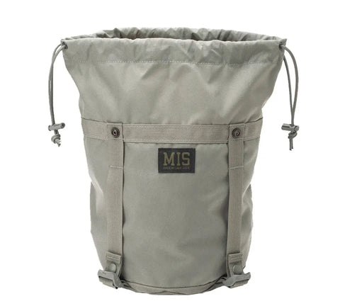 The MIS Compression Stuff Sack Small in Foliage is a water-resistant, 9L Codura Nylon tote with side buckles and a front patch labeled MIS MADE IN CALIF. USA, shown against a white background.