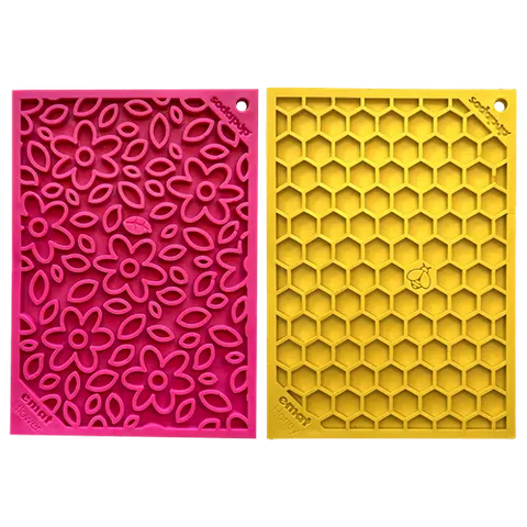 The SodaPup Small Pink Flower Power & Yellow Honeycomb EMat Lick Mat Bundle features two silicone mats, each with a paw print and emmy embossed—ideal for dog enrichment and promoting healthy teeth and gums.