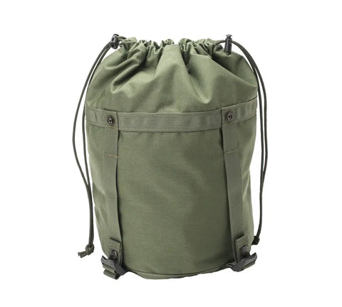 The MIS Compression Stuff Sack Small in camo green features a military-style, water-resistant canvas design with a drawstring closure, straps, and front buckles, shown against a white background.