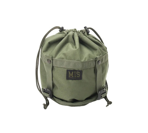 The MIS Compression Stuff Sack Small in Camo Green features a sturdy, utilitarian design with a black MIS Made in USA patch, drawstring closure, two snap buttons, adjustable cords, and water-resistant construction.