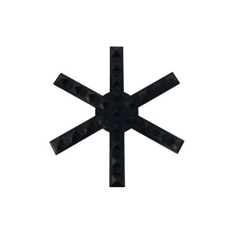 The Chatelet Manufacturing Snowboard Stomp Pad features a black snowflake spike pattern with six studded arms, designed for better grip and adhesion to snowboards; shown set against a white background.