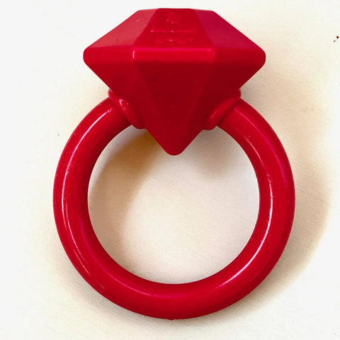 The SodaPup Diamond Ring Durable Teething Ring is a red nylon dog chew toy with a large, diamond-shaped top and circular band, veterinarian approved, shown on a light background.