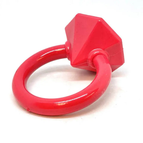 The SodaPup Diamond Ring Durable Teething Ring is a large, bright pink plastic dog chew toy with a faceted diamond-shaped top and circular band—veterinarian approved and perfect for playful pups.