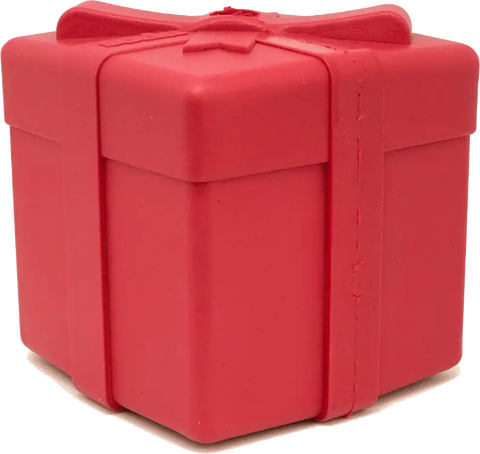 The SodaPup Gift Box EDispenser is a durable rubber chew toy and treat dispenser shaped like a red gift with a raised bow, ribbon details, smooth matte surface, sharp edges, and provides a fun way to reward your pet.