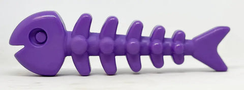 The SodaPup Fish Bone Ultra Durable Nylon Chew Toy is a purple, cartoonish skeleton-shaped chew toy with a rounded head, prominent ribs, and tail—designed for power chewers and shown on a plain white background.