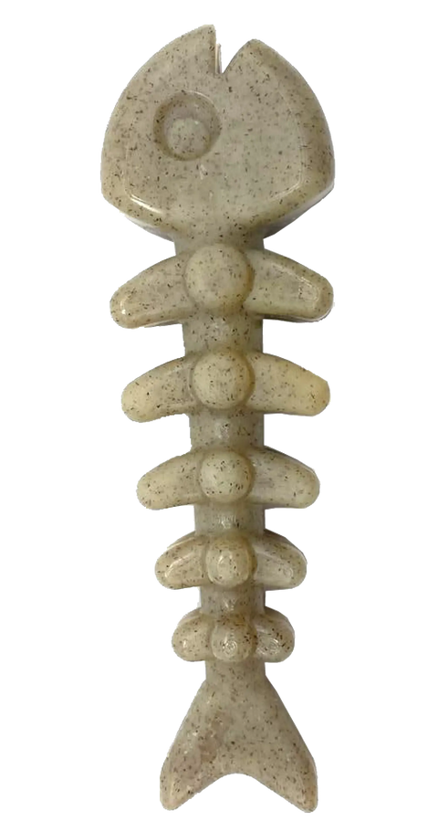 The SodaPup Fish Bone Ultra Durable Nylon Chew Toy features a stylized fish skeleton design with a fish head, curved ribs, and a triangular tail. Made for power chewers, this off-white toy has dark speckles and is built to last.