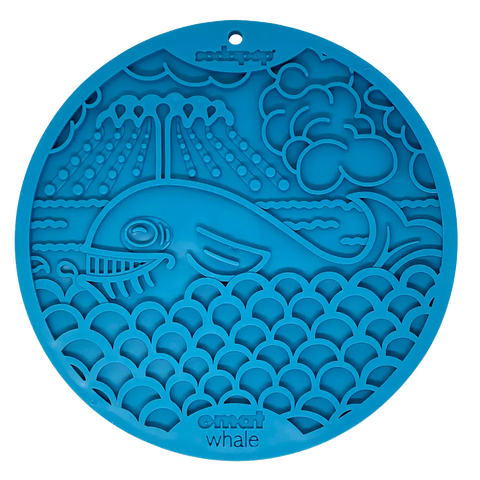 The Whale Design EMat Enrichment Lick Mat With Suction Cups by SodaPup features a blue circular silicone mat with a raised smiling whale, clouds, sun rays, and waves—perfect for keeping dogs engaged during bath time.