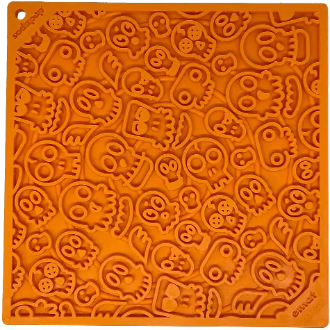 The SodaPup Zombie Design Emat Enrichment Lick Mat is an orange silicone mat with cartoon skulls, bones, and winged skulls—perfect as a fun dog enrichment toy or lick mat to help relieve your pup’s anxiety.