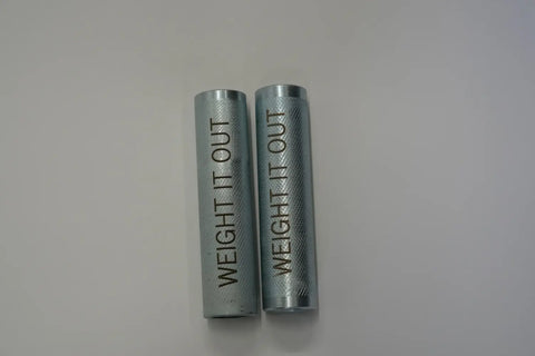 A pair of Weight It Out Dumbbell Standard 1 Handle Screwable Pair, each with a textured silver cylindrical design and bold vertical WEIGHT IT OUT branding, are positioned side by side on a white background.