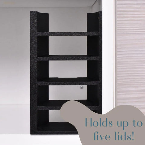 The Chatelet Manufacturing Lid Organizer Compatible With Stanley Cup Lids is a black, vertical holder for up to 5 lids with straw storage, designed for cabinets or counters. A blue label reads Holds up to five lids! Made in USA.