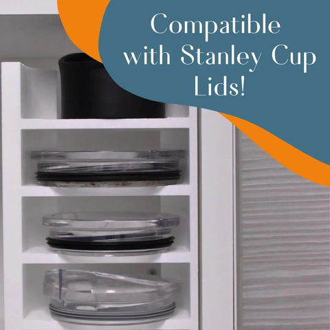 Close-up of a Chatelet Manufacturing Lid Organizer Compatible With Stanley Cup Lids, holding several lids and a black cup, with “Compatible with Stanley Cup Lids!” text over a blue and orange background. Organizer includes straws storage.