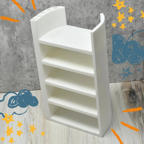 The Chatelet Manufacturing Lid Organizer Compatible With Stanley Cup Lids holds 5 lids and straws, ideal for cabinets or kitchen counters. This USA-made white shelving unit is shown on wood against a gray wall, decorated with blue clouds and yellow stars.