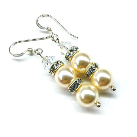 Bridal Sterling Silver Stacked Crystal and Pearl Earrings by Alexa Martha Designs, featuring two cream pearls, sparkling rhinestone spacers, and a clear faceted bead on hook ear wires—perfect bridesmaid gift.