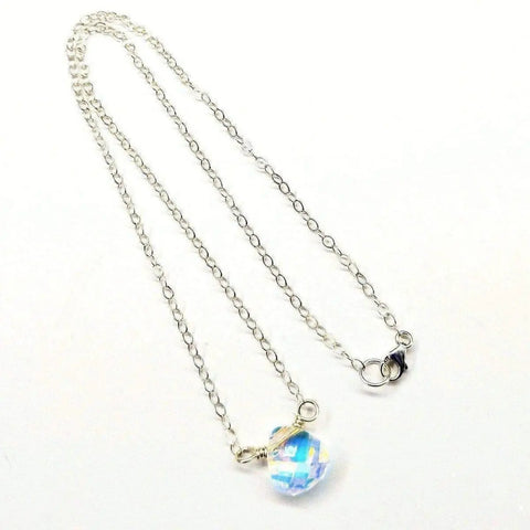 The Alexa Martha Designs Sterling Silver Wire Wrapped Crystal Briolette Drop Necklace features a sparkling pendant on a delicate chain—an elegant choice for bridesmaid jewelry.
