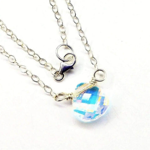The Sterling Silver Wire Wrapped Crystal Briolette Drop Necklace by Alexa Martha Designs features a faceted Swarovski crystal briolette on a sterling silver chain—an elegant choice for bridesmaid jewelry.