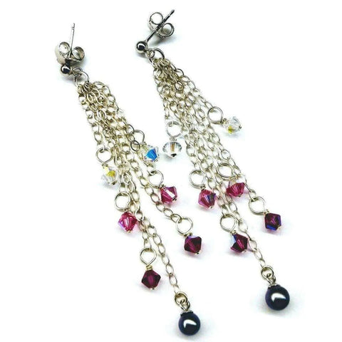 The Long Sterling Silver Crystal Pearl Tassel Earrings by Alexa Martha Designs feature chain links, pink and clear Swarovski crystals, a single black bead at the end of each earring, and are displayed on a white background.