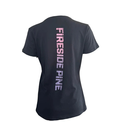 Sunrise Hiker (W) by Fireside Pine is a black short-sleeve T-shirt made from breathable fabric, featuring “FIRESIDE PINE” printed vertically in pink distressed font down the back.