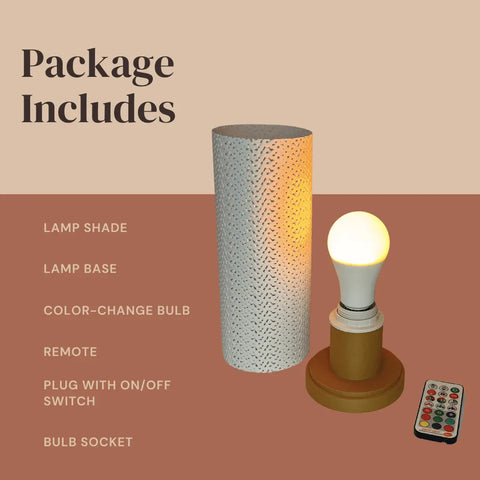 The Surface Beam Lamp by Chatelet Manufacturing is an innovative table lamp for nightstands, end tables, and coffee tables. Package includes a textured lampshade, color-changing LED base, remote control, and plug with on/off switch.