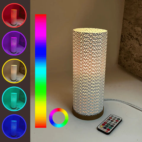 The Chatelet Manufacturing Surface Beam Lamp is a cylindrical, color-changing LED lamp for tables. It emits warm white light and offers five colors—red, pink, yellow, green, blue—with remote control and vertical rainbow bar plus color wheel for selection.