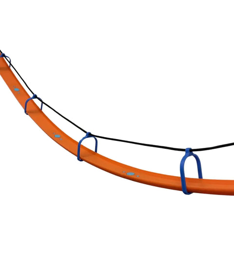 Close-up of Chatelet Manufacturing’s Suspension Bridge Kit compatible with Hot Wheels racetracks, featuring an orange curved track, blue loops, and black rope; includes 10 bridge supports and wall connectors. Made in USA.