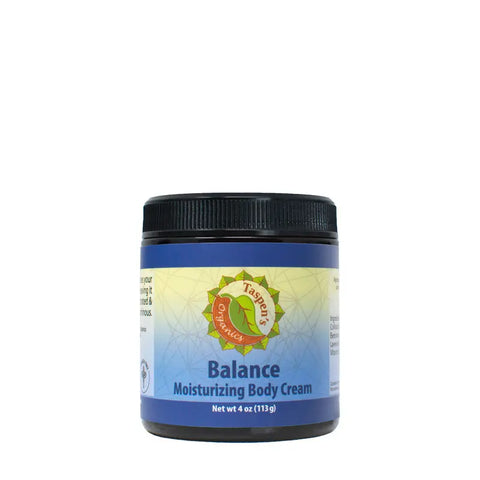 A jar of Taspens Organics Balance Moisturizing Body Cream, featuring a blue and yellow label and black lid, is displayed against a white background.