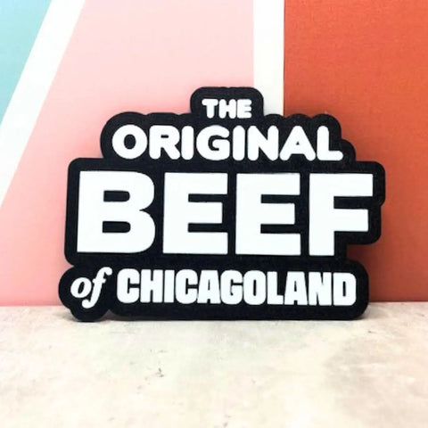 A pastel-toned fridge magnet by Chatelet Manufacturing reads “The Original Beef of Chicagoland”—a perfect decorative gift for fans of the hit TV show The Bear and collectors of unique memorabilia.