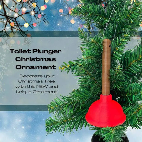 A Toilet Plunger Christmas Ornament by Chatelet Manufacturing hangs on a decorated tree. This funny holiday accent is made in the USA—add unique charm to your Christmas décor with this playful ornament!.