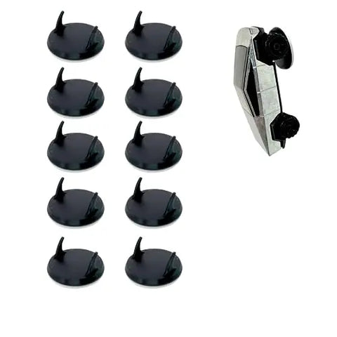 Ten small black Chatelet Manufacturing stands, from the Toy Car Wall Display Organizer compatible with Hot Wheels, are arranged in two columns on the left; a silver miniature Cybertruck toy stands vertically on the right.