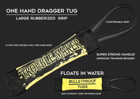 The Troublemaker One Hand Dragger Fire Hose Training Tug by Bulletproof Pet Products Inc is a black and yellow tug with a comfortable rubberized grip, strong handle, floats in water, and can be customized—perfect for durable dog training.