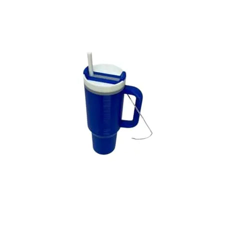 The Tumbler Cup Replica Christmas Ornament by Chatelet Manufacturing is a blue plastic travel mug with a handle, white lid, straw, and small chain—perfect for unique 2023 holiday tree decor. Made in the USA.